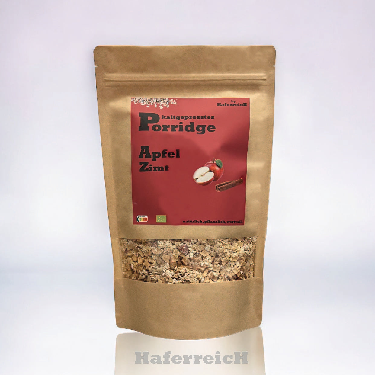 Verpackung von kaltgepresstem Porridge in der Sorte Apfel Zimt von der Marke Haferreich.