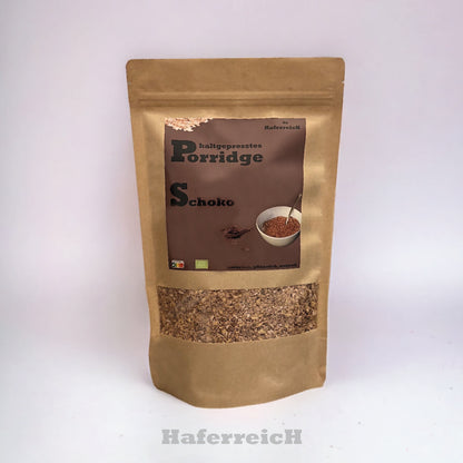 Verpackung von kaltgepresstem Porridge in der Sorte Schoko von der Marke Haferreich.